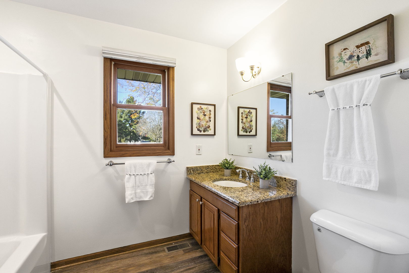 10201 Fox Bluff Lane Spring Grove, IL 60081 - Photo 13 of 26 a bathroom with a granite countertop sink and a mirror