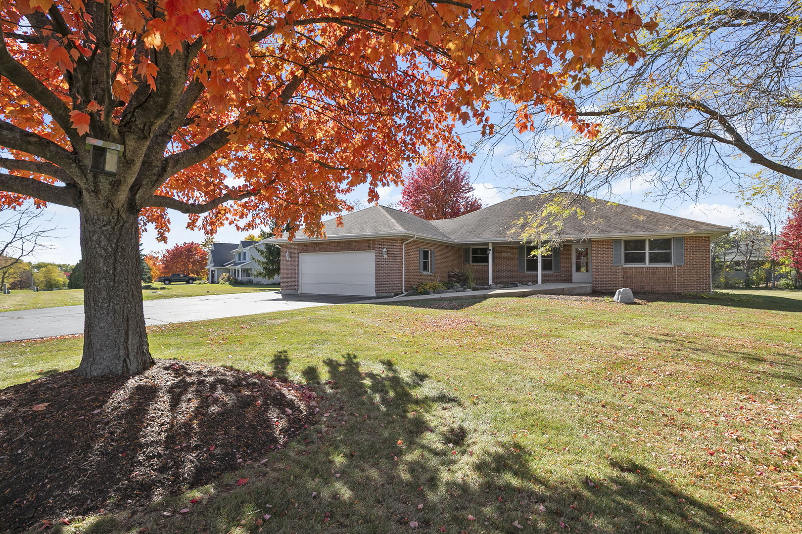 10201 Fox Bluff Lane Spring Grove, IL 60081 - Photo 26 of 26 a front view of house with yard and swimming pool