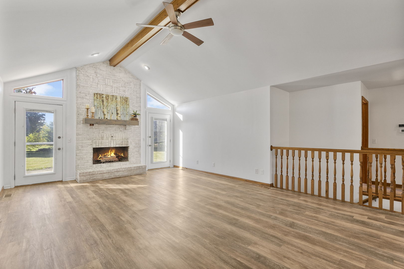 10201 Fox Bluff Lane Spring Grove, IL 60081 - Photo 4 of 26 a view of an empty room with a fireplace and a window