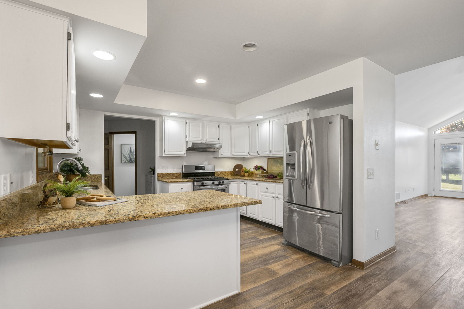 10201 Fox Bluff Lane Spring Grove, IL 60081 - Photo 6 of 26 a kitchen with refrigerator and cabinets