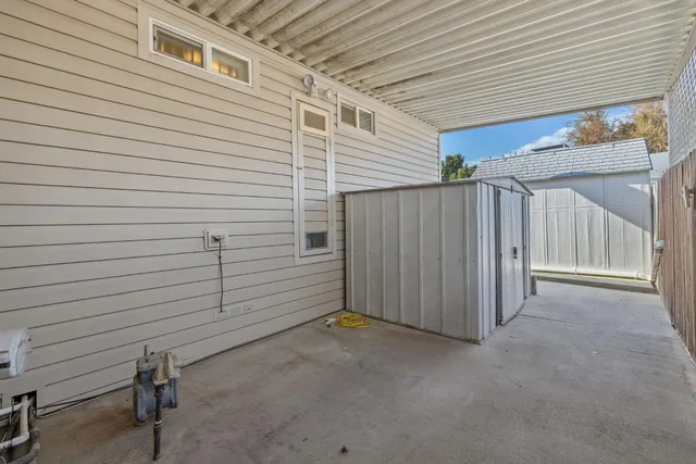 a view of swimming pool with an outdoor space and seating area