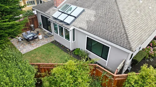 front view of a house with a yard