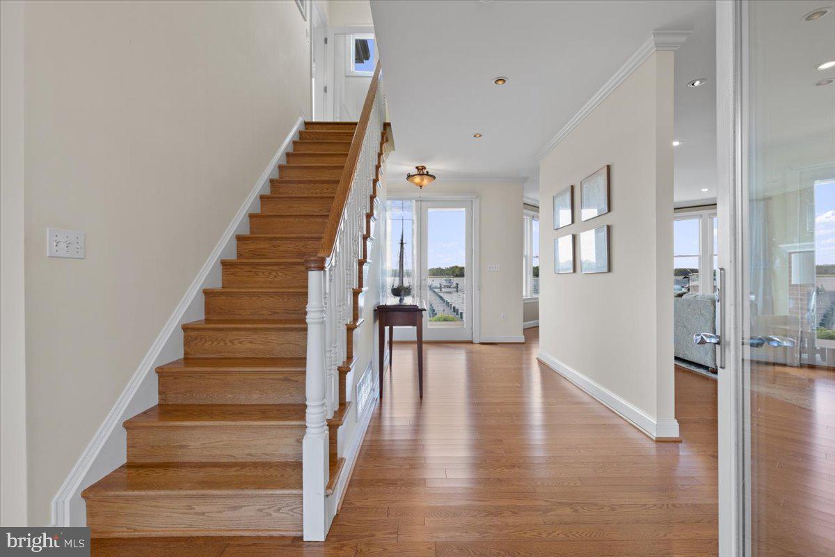 1100 Steamboat Road Shady Side, MD 20764 - Photo 11 of 81 a view of entryway and hall with wooden floor