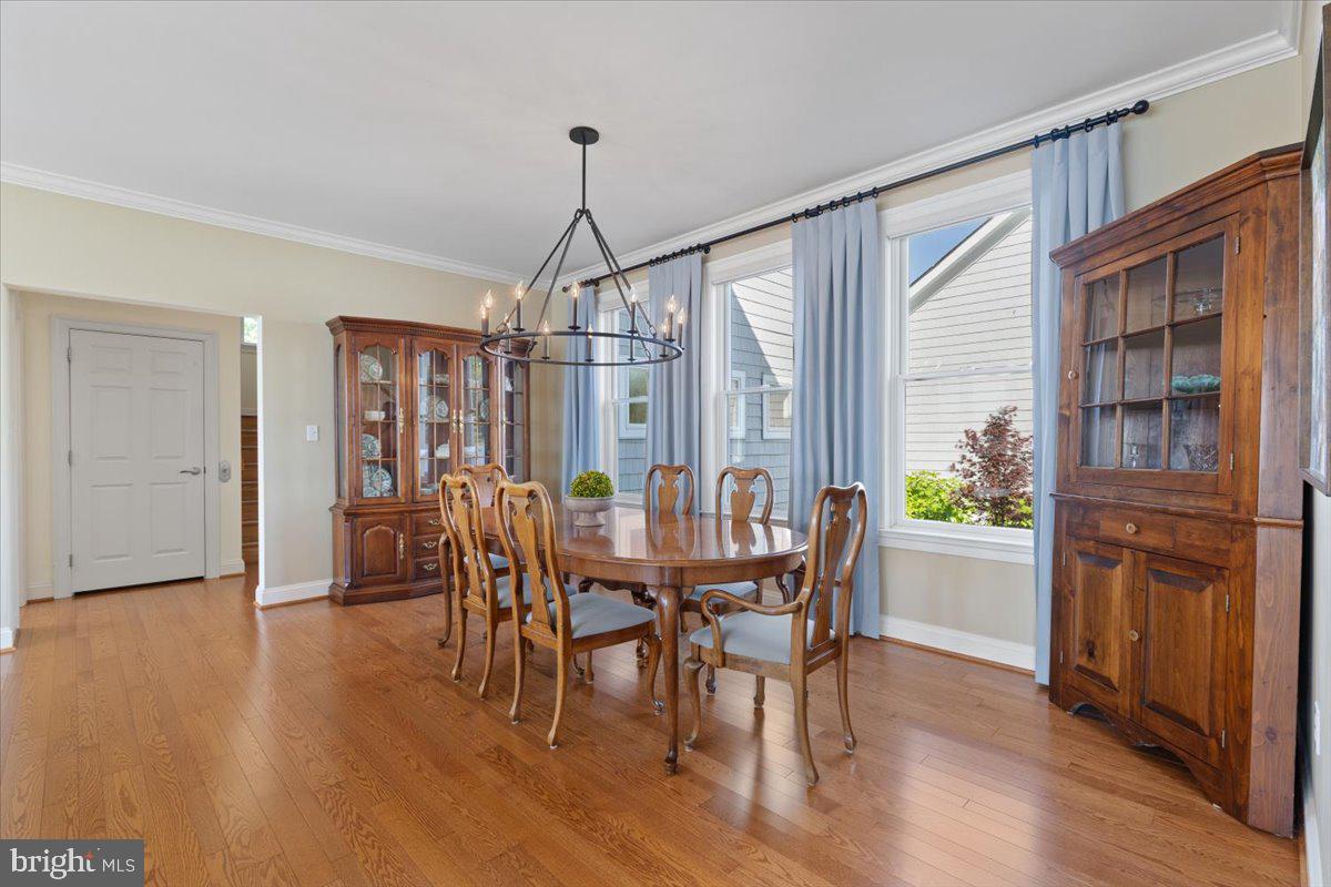 1100 Steamboat Road Shady Side, MD 20764 - Photo 23 of 81 a view of a dining room with furniture window and wooden floor
