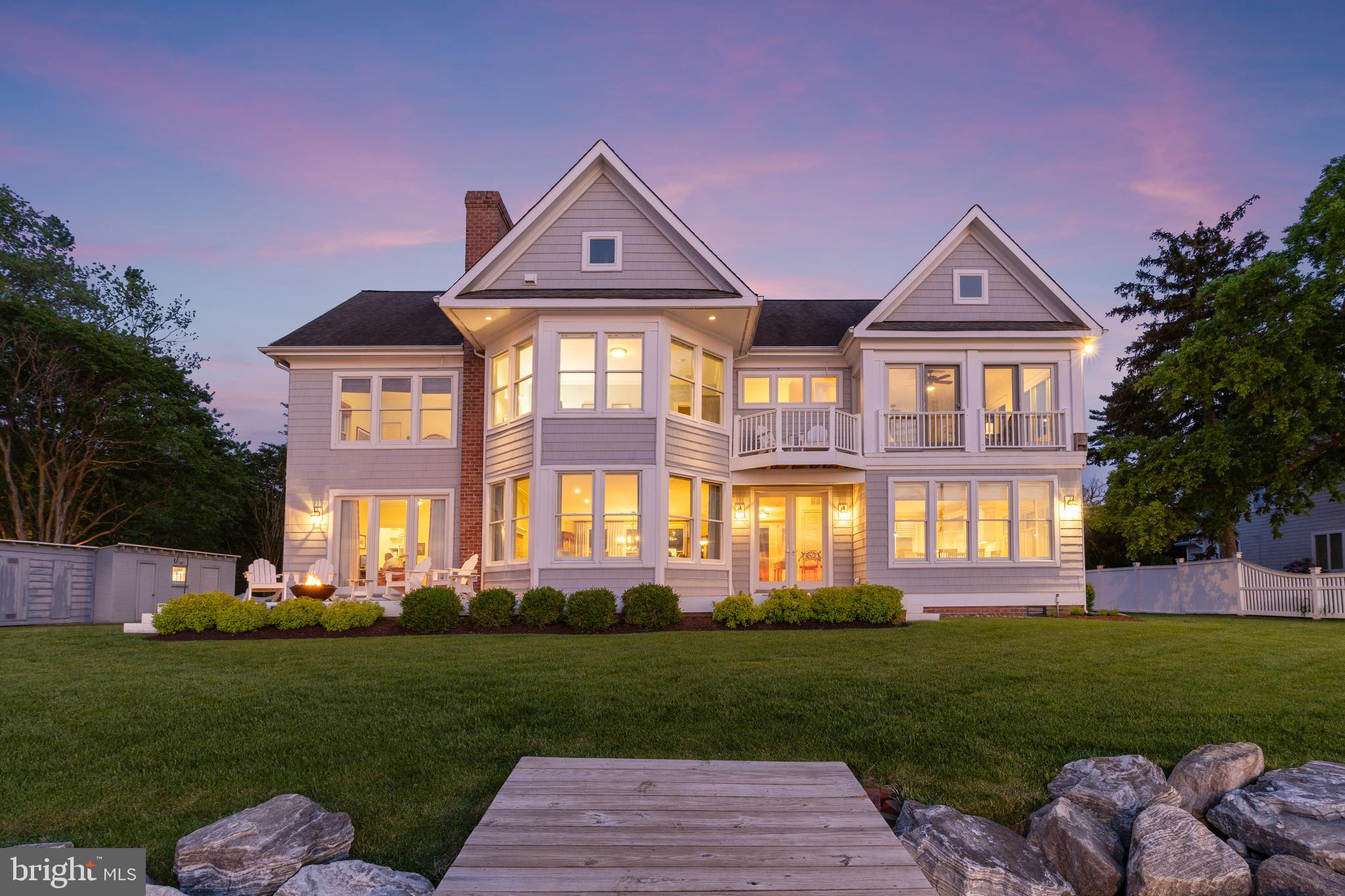 1100 Steamboat Road Shady Side, MD 20764 - Photo 3 of 81 a front view of a house with a yard