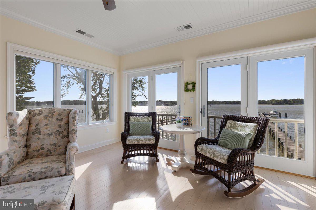 1100 Steamboat Road Shady Side, MD 20764 - Photo 40 of 81 a living room with furniture and a large window