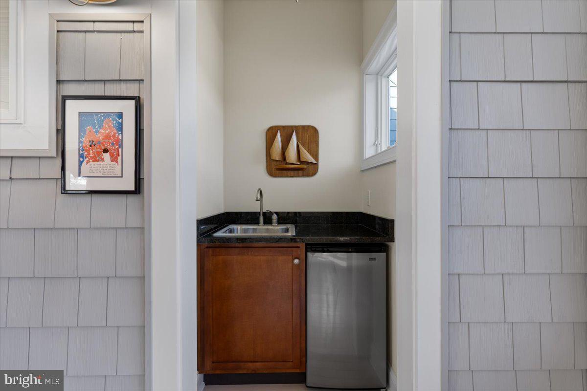 1100 Steamboat Road Shady Side, MD 20764 - Photo 45 of 81 Convenient wet bar in family room