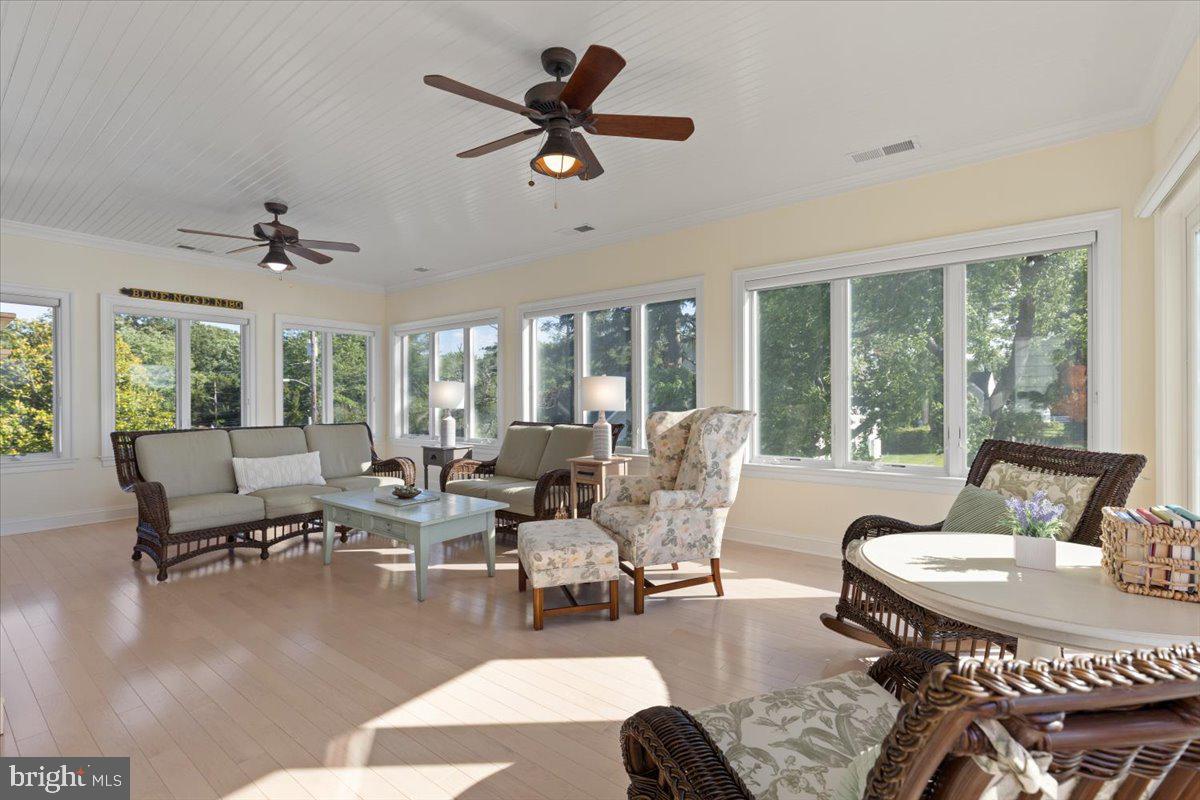 1100 Steamboat Road Shady Side, MD 20764 - Photo 46 of 81 a living room with furniture and a large window