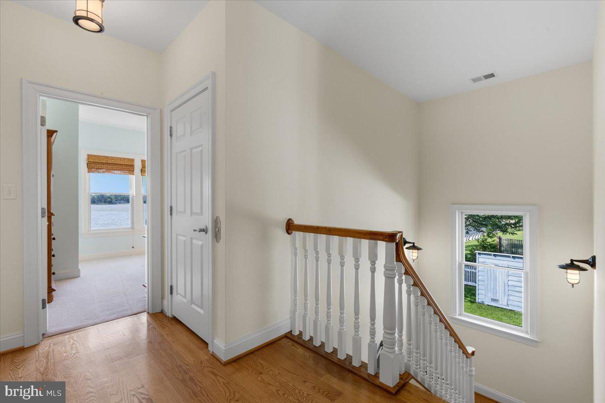 1100 Steamboat Road Shady Side, MD 20764 - Photo 47 of 81 Side staircase & elevator access to guest wing