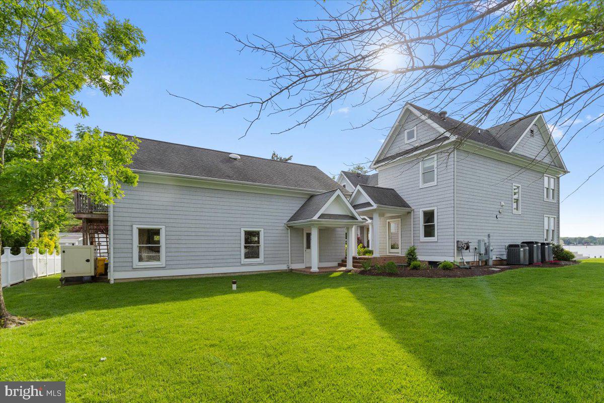 1100 Steamboat Road Shady Side, MD 20764 - Photo 59 of 81 a front view of house with yard and green space