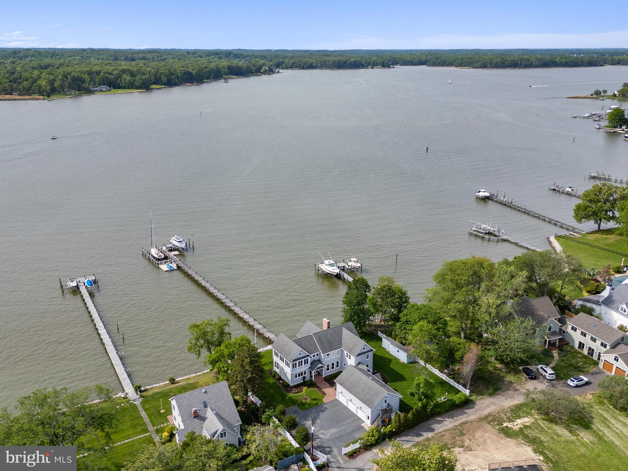 1100 Steamboat Road Shady Side, MD 20764 - Photo 6 of 81 an aerial view of a house with a lake and lake view