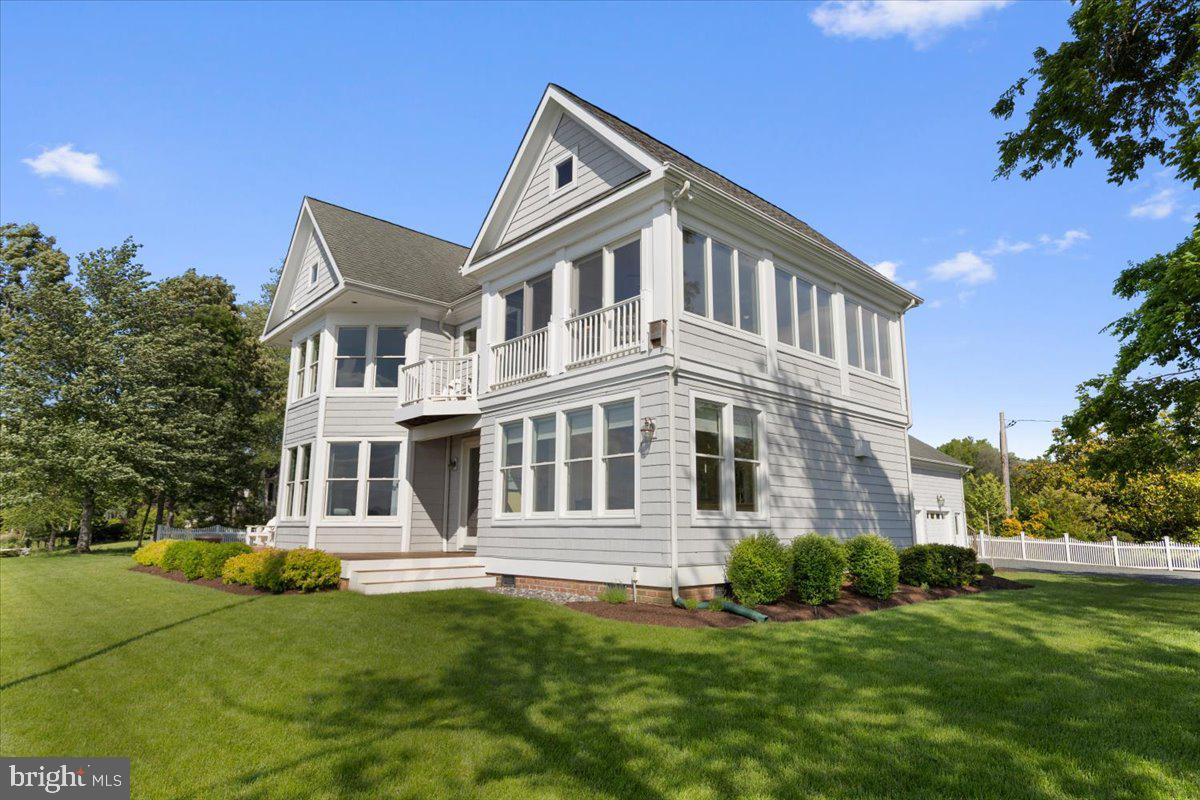 1100 Steamboat Road Shady Side, MD 20764 - Photo 61 of 81 a front view of a house with a yard