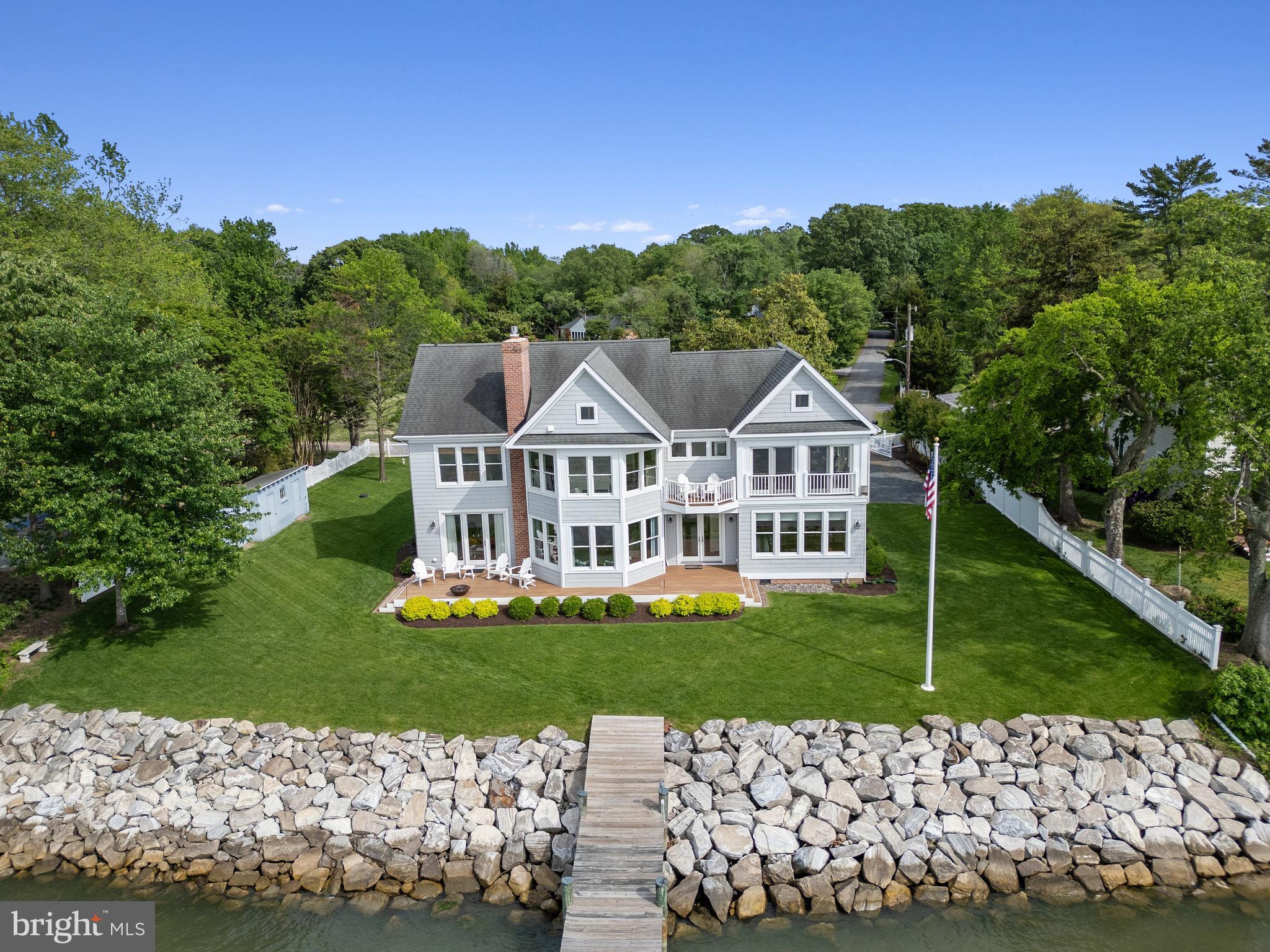 1100 Steamboat Road Shady Side, MD 20764 - Photo 70 of 81 a view of a house with a yard and sitting area