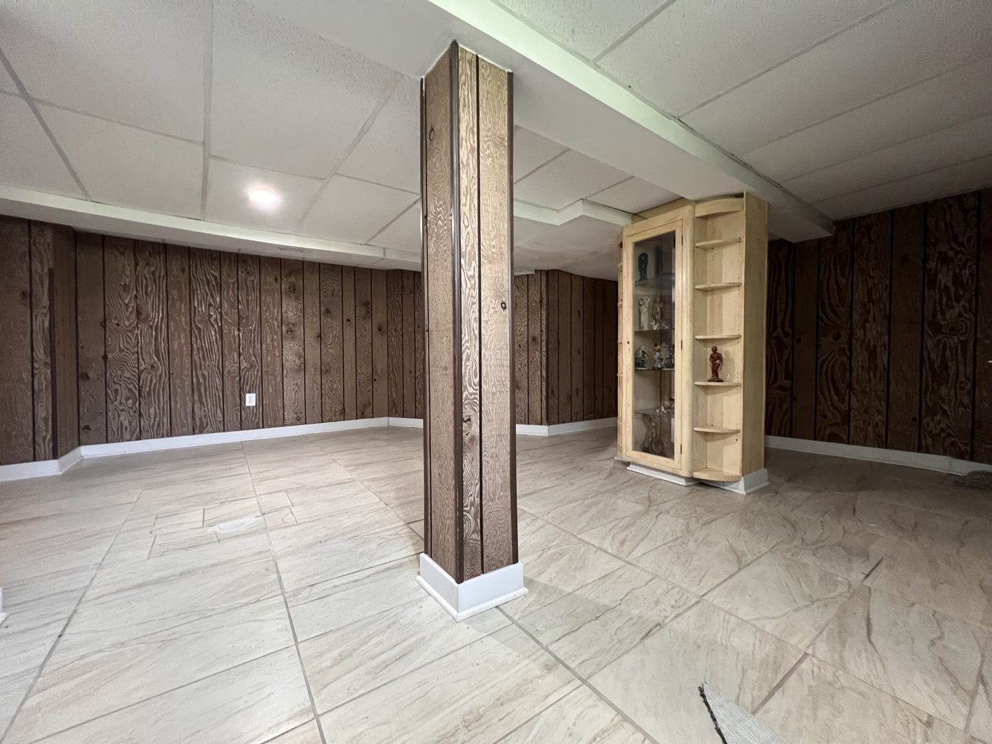 6528 South Sangamon Street Chicago, IL 60621 - Photo 12 of 14 a view of an empty room with wooden walls