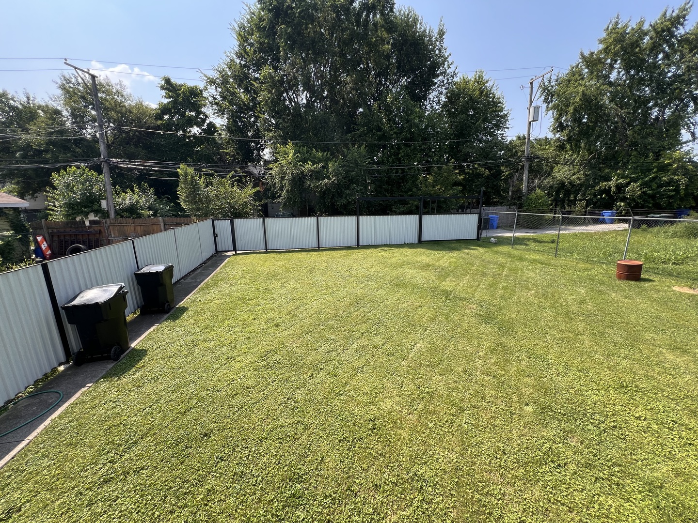 6528 South Sangamon Street Chicago, IL 60621 - Photo 13 of 14 a view of a swimming pool with a yard