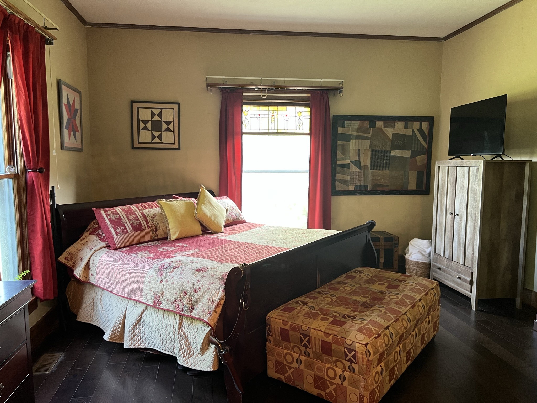 201 Butler Bridge Road Portland, TN 37148 - Photo 21 of 51 a bedroom with a bed tv and a window