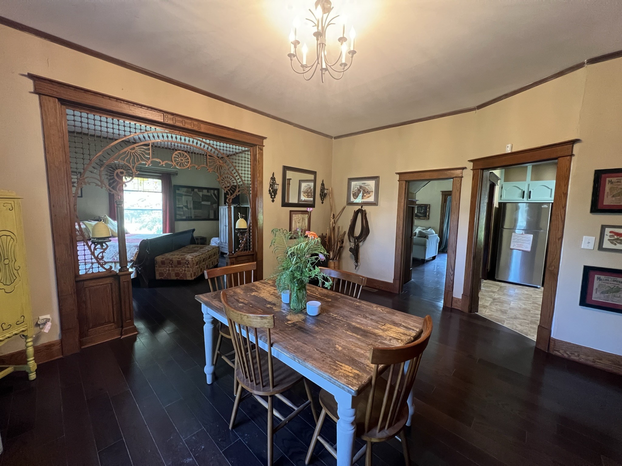 201 Butler Bridge Road Portland, TN 37148 - Photo 24 of 51 a view of a dining room with furniture wooden floor and a chandelier