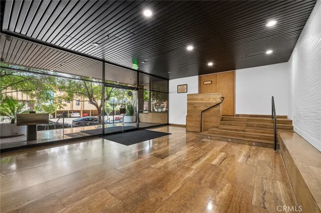a large hall with furniture and a table