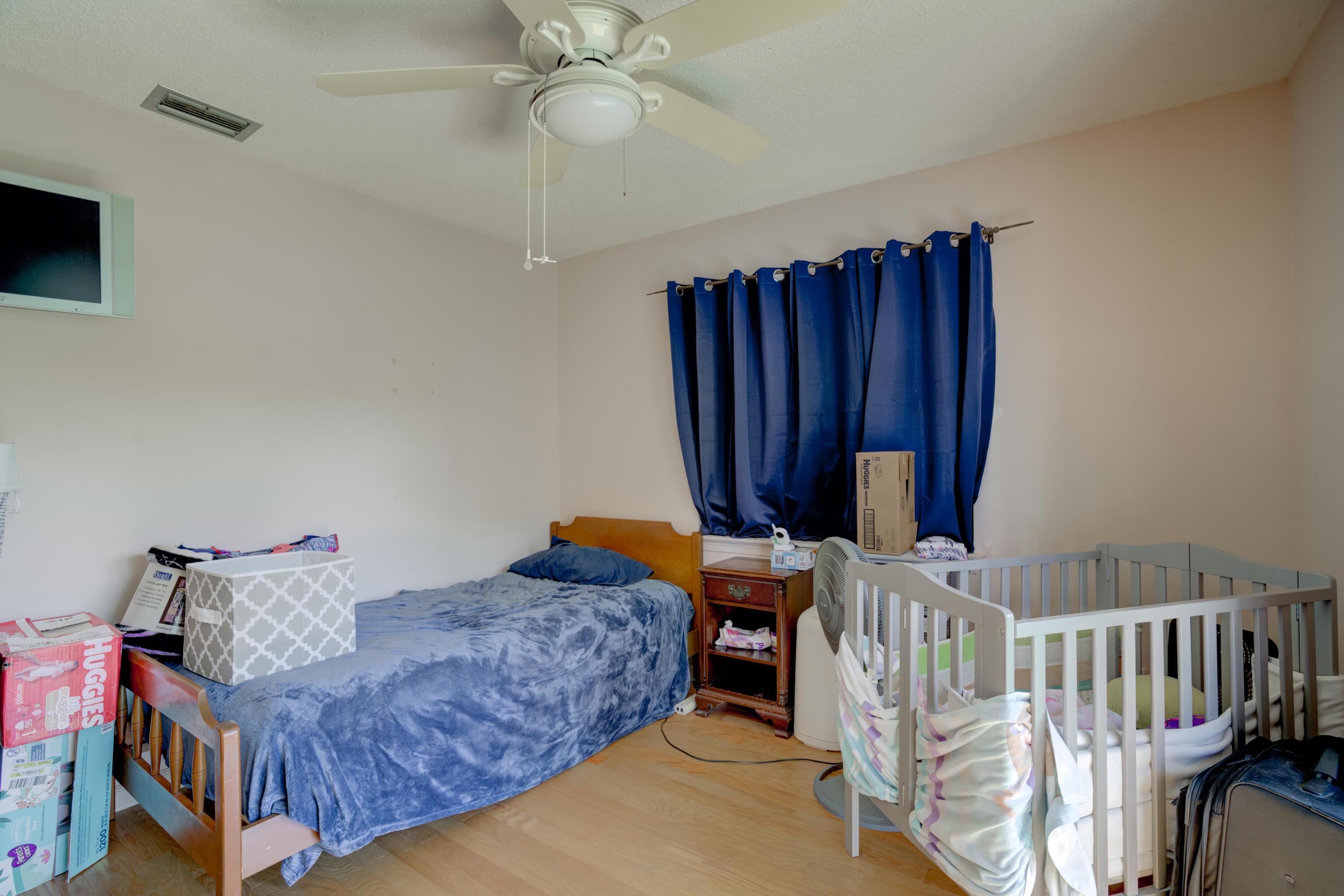 9524 Southeast Cove Point Street Jupiter, FL 33469 - Photo 38 of 58 Guest bedroom