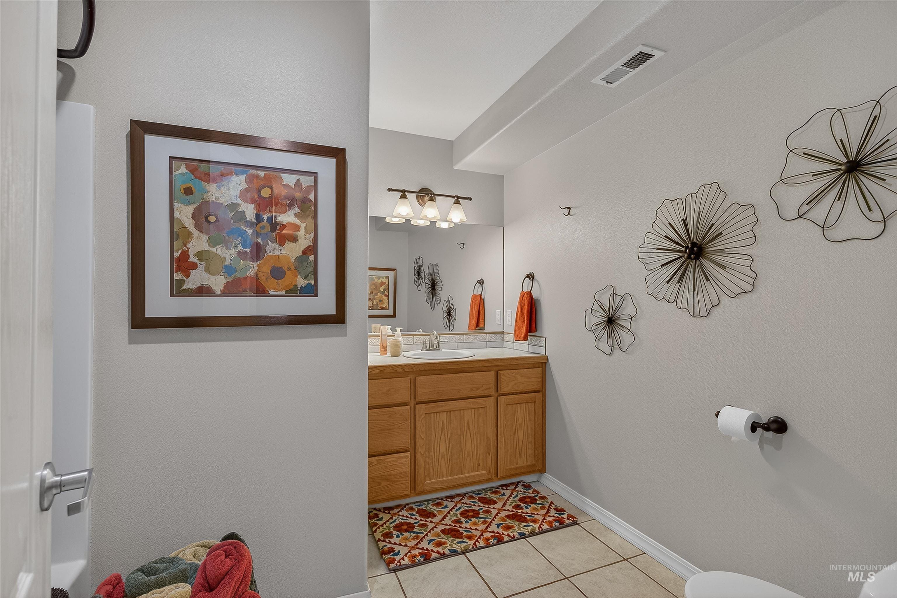 3978 Foothill Drive Lewiston, ID 83501 - Photo 26 of 40 Bathroom featuring vanity and light tile patterned floors