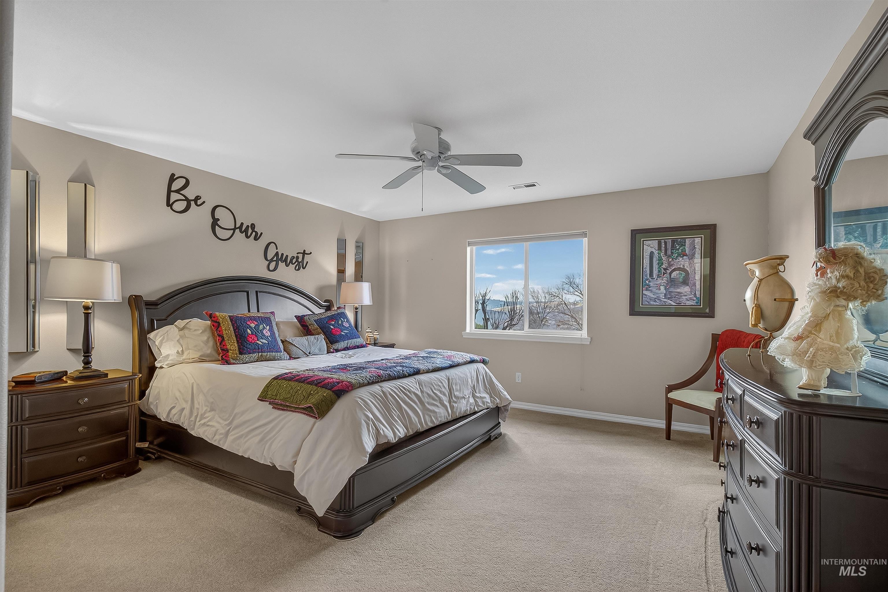 3978 Foothill Drive Lewiston, ID 83501 - Photo 27 of 40 Bedroom with light carpet and a ceiling fan