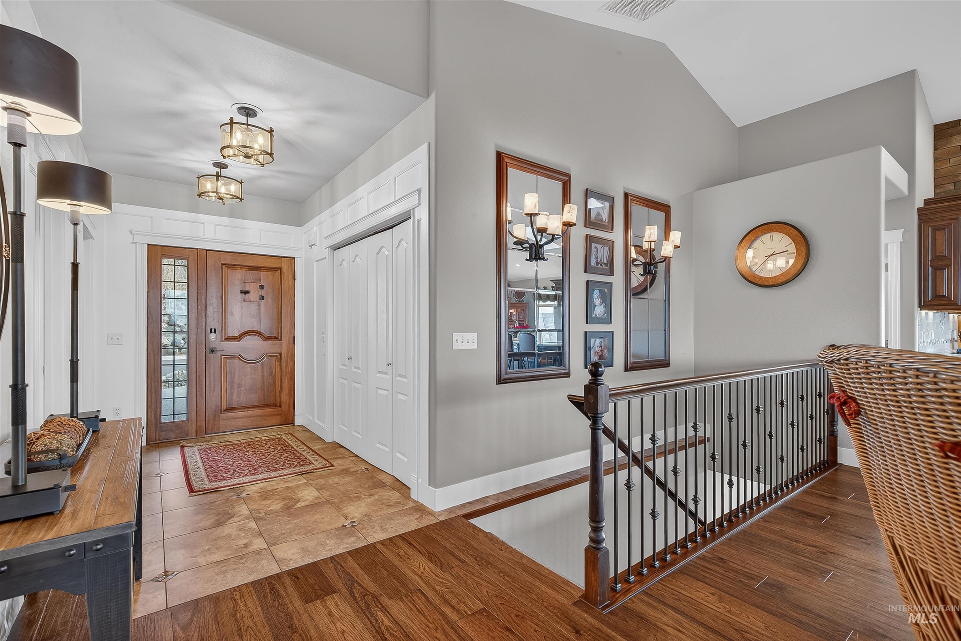3978 Foothill Drive Lewiston, ID 83501 - Photo 5 of 40 Entrance foyer with a chandelier, wood finished floors, and lofted ceiling