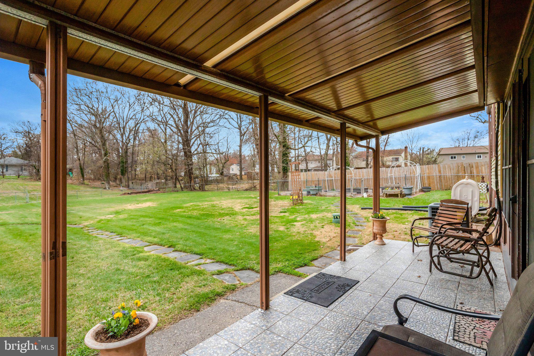 8010 Allentown Road Fort Washington, MD 20744 - Photo 12 of 16 a view of a porch with furniture and garden