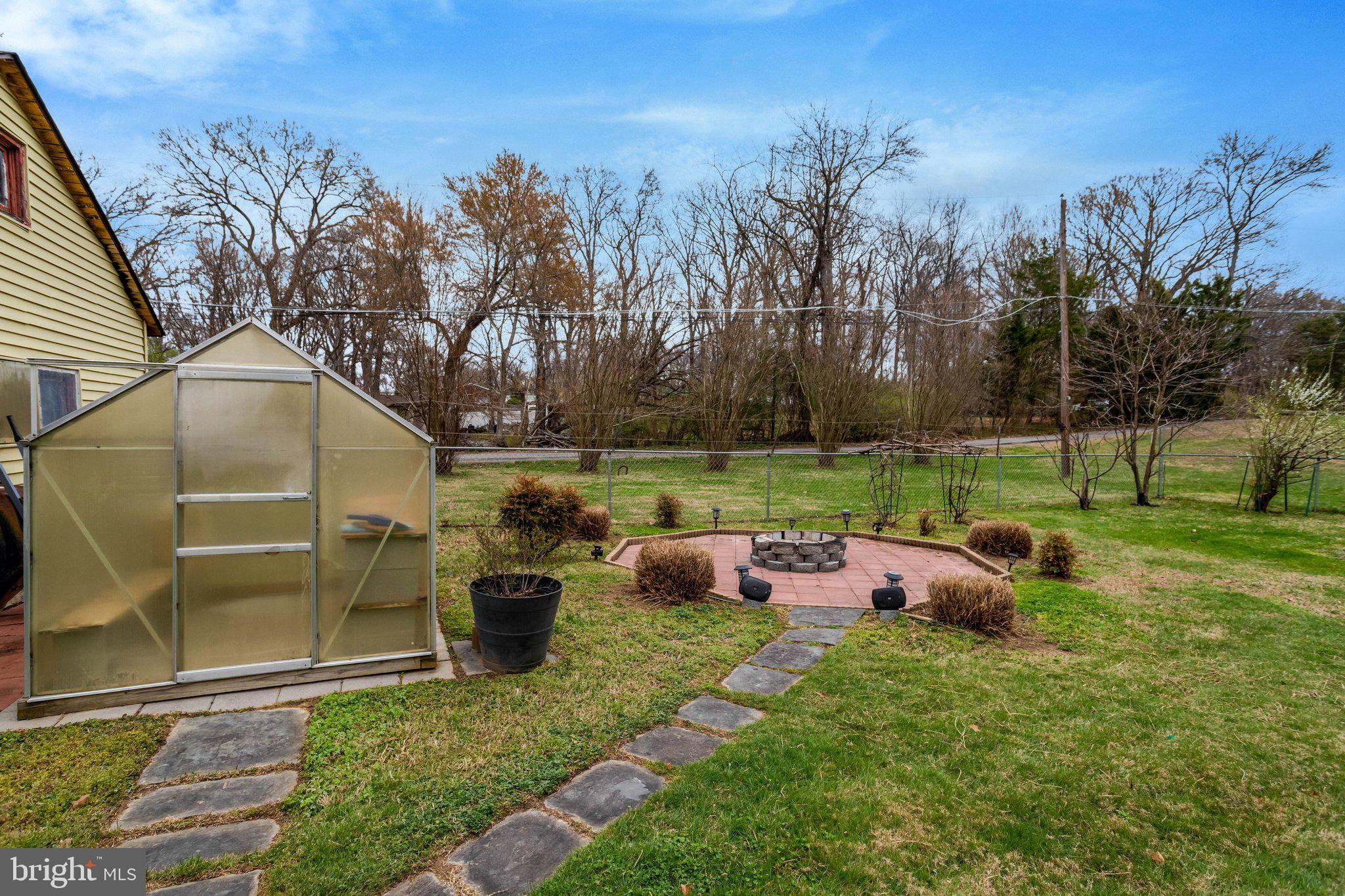 8010 Allentown Road Fort Washington, MD 20744 - Photo 14 of 16 a view of a backyard with sitting area