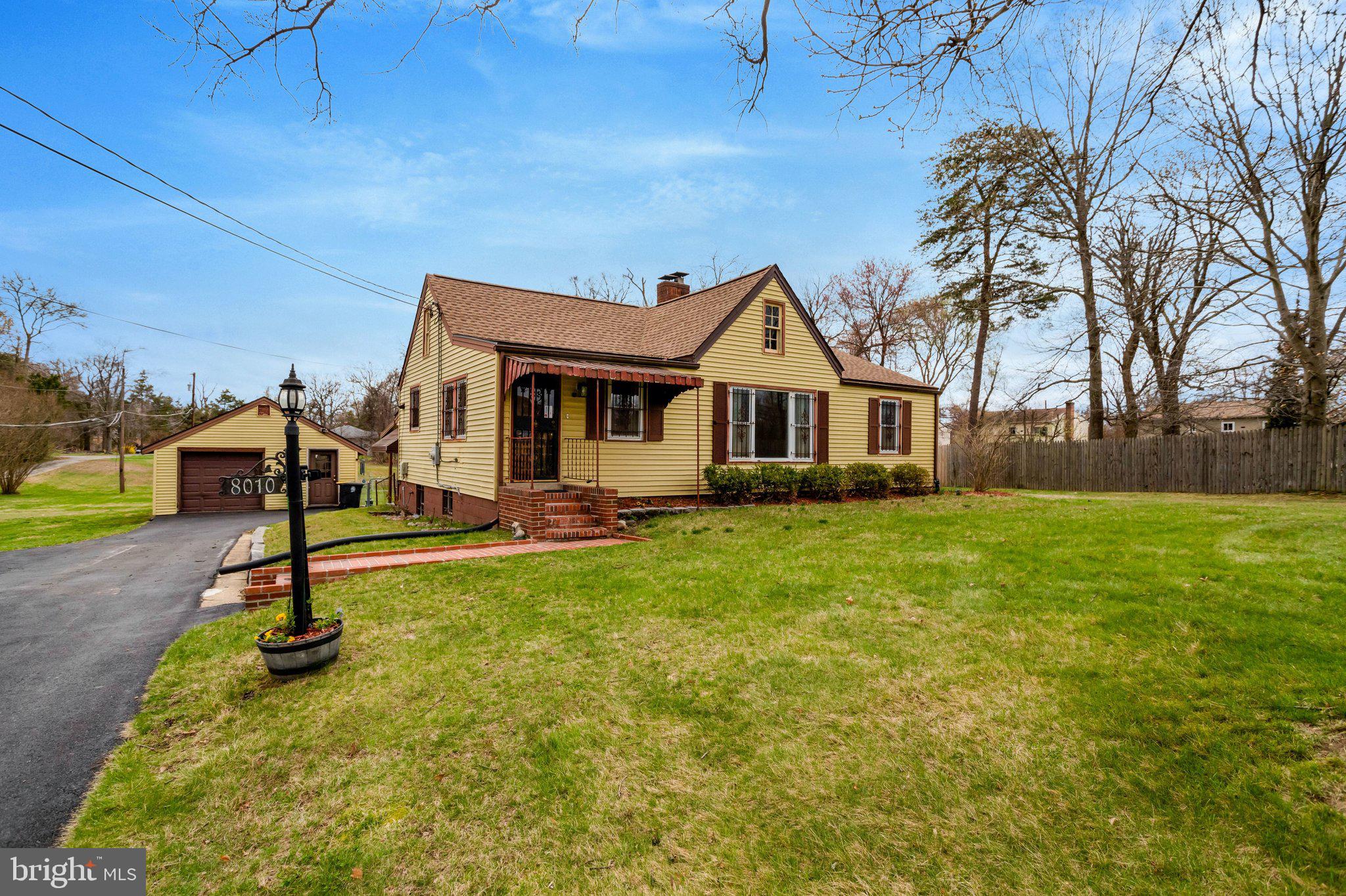8010 Allentown Road Fort Washington, MD 20744 - Photo 15 of 16 a front view of a house with a yard