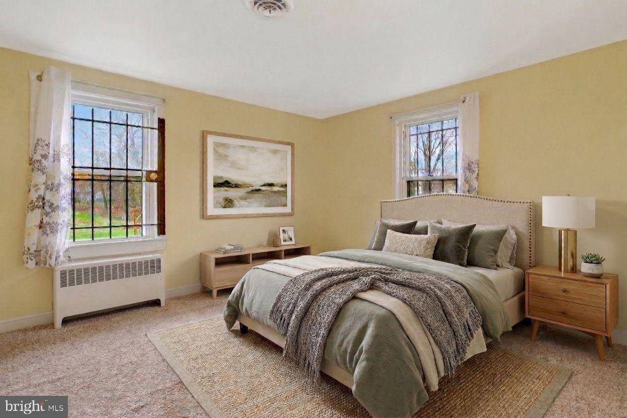 8010 Allentown Road Fort Washington, MD 20744 - Photo 6 of 16 a bedroom with a bed and a window