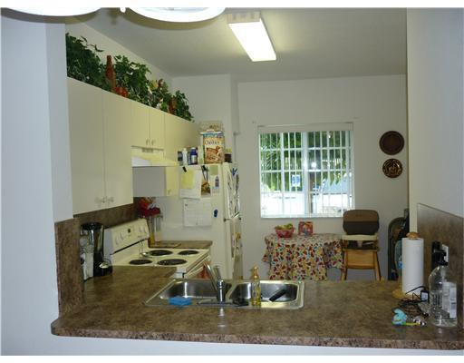 5926 Riverside Avenue, Unit 5926 Tamarac, FL 33321 - Photo 3 of 9 Kitchen