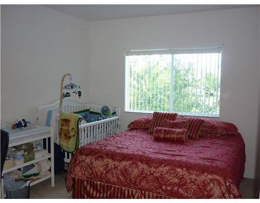 5926 Riverside Avenue, Unit 5926 Tamarac, FL 33321 - Photo 4 of 9 Master Bedroom