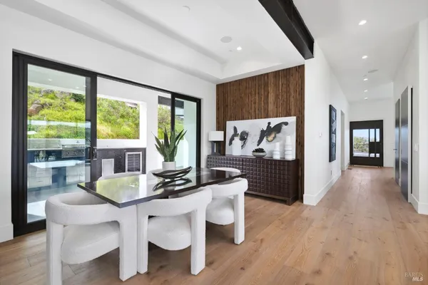 a kitchen with a counter top space a sink cabinets and appliances