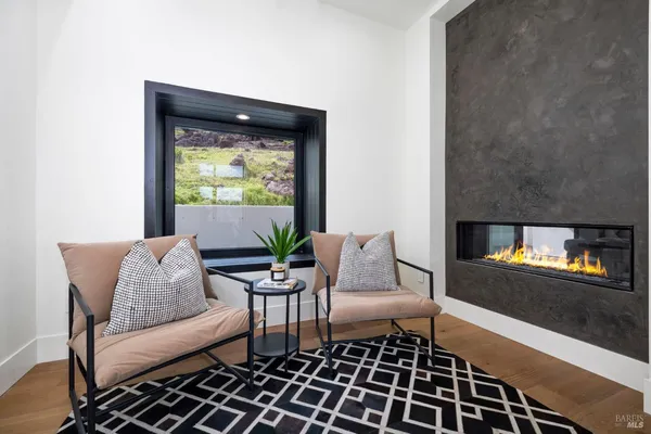 a bathroom with a toilet a sink and a mirror