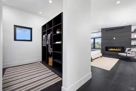 a bathroom with a double vanity sink and mirror