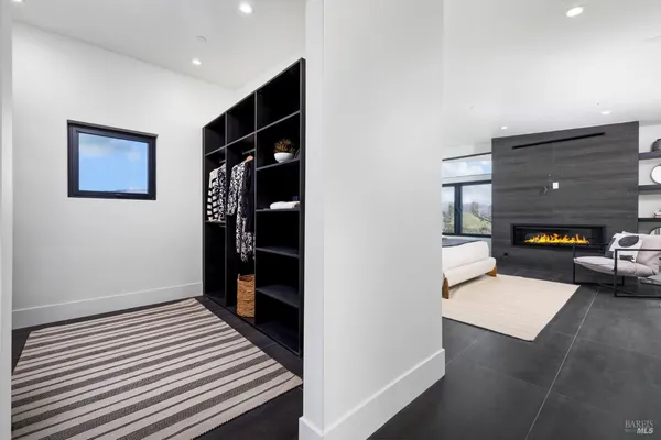 a bathroom with a double vanity sink and mirror