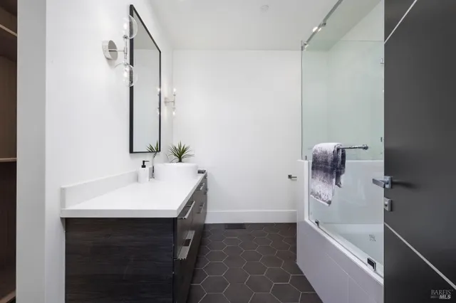 a view of a balcony with chairs