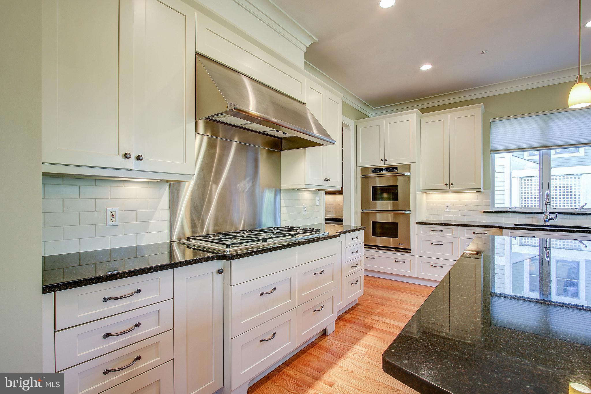 6604 Pyle Road Bethesda, MD 20817 - Photo 15 of 50 KITCHEN W/WHITE CABINETRY
