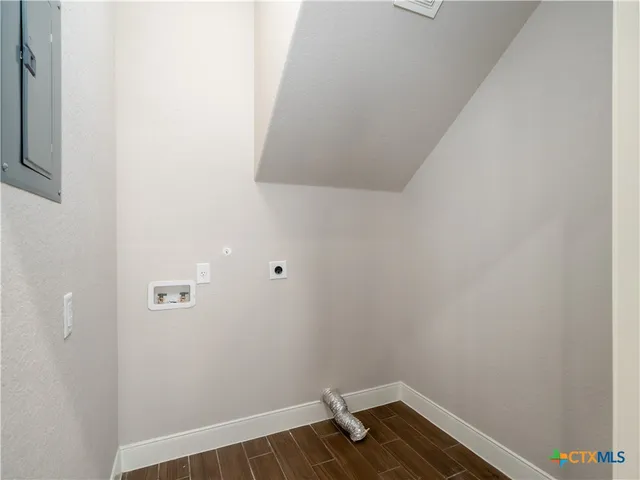 a view of small space with wooden floor