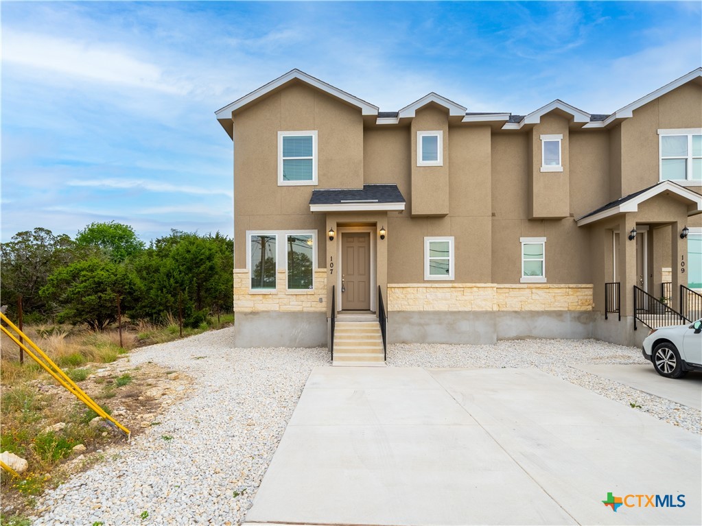 109 High Drive Spring Branch, TX 78070 - Photo 2 of 20 a front view of a house with a yard