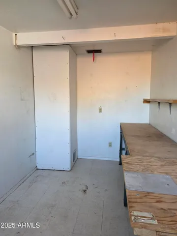 a view of a room with an empty space