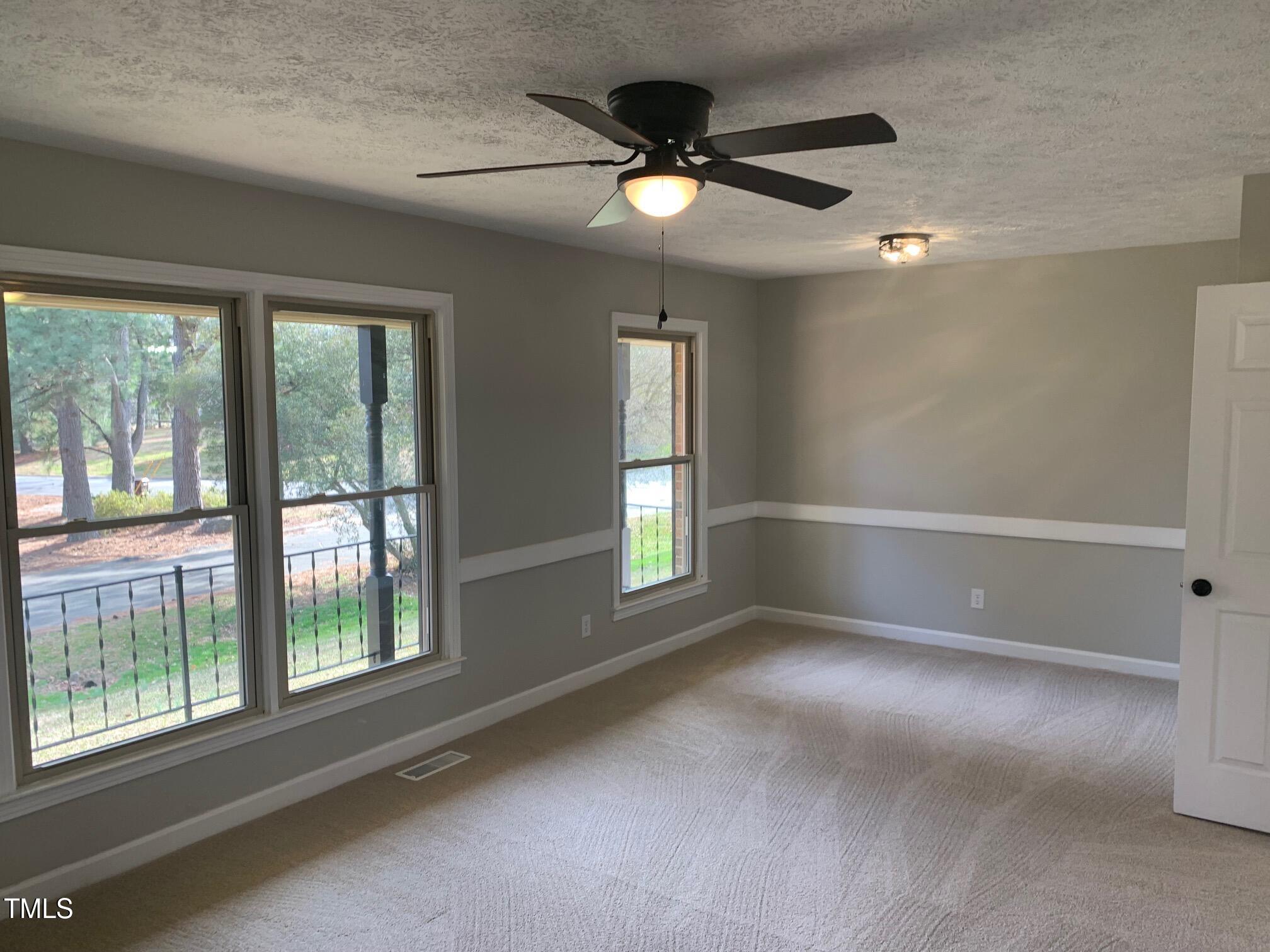 209 Reade Drive Roxboro, NC 27573 - Photo 13 of 19 a view of an empty room with a window