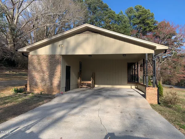 a view of a house with a garage