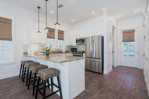 a bedroom with a bed and a cabinets