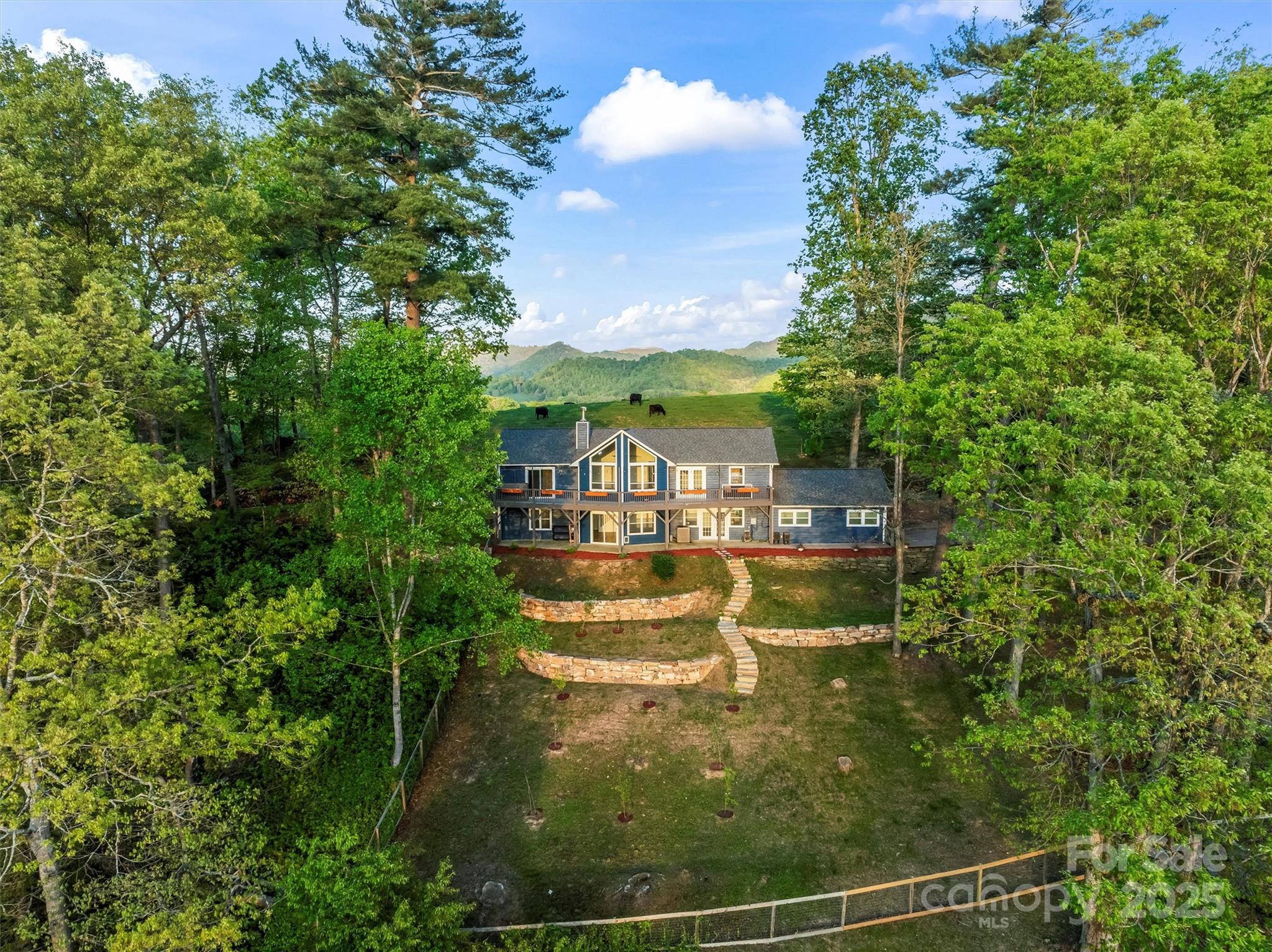 a view of a swimming pool next to a yard