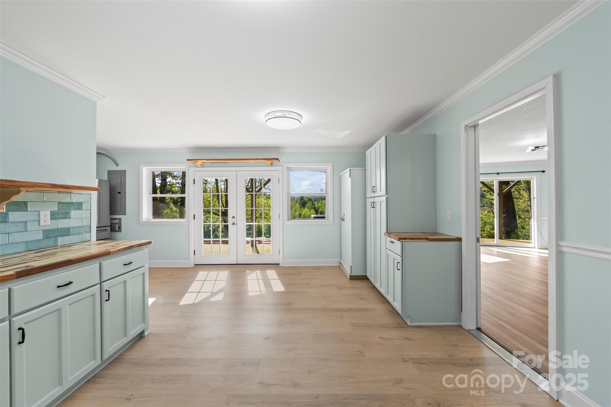 84 Halfmoon Way Clyde, NC 28721 - Photo 33 of 48 a view of a kitchen with a sink and windows
