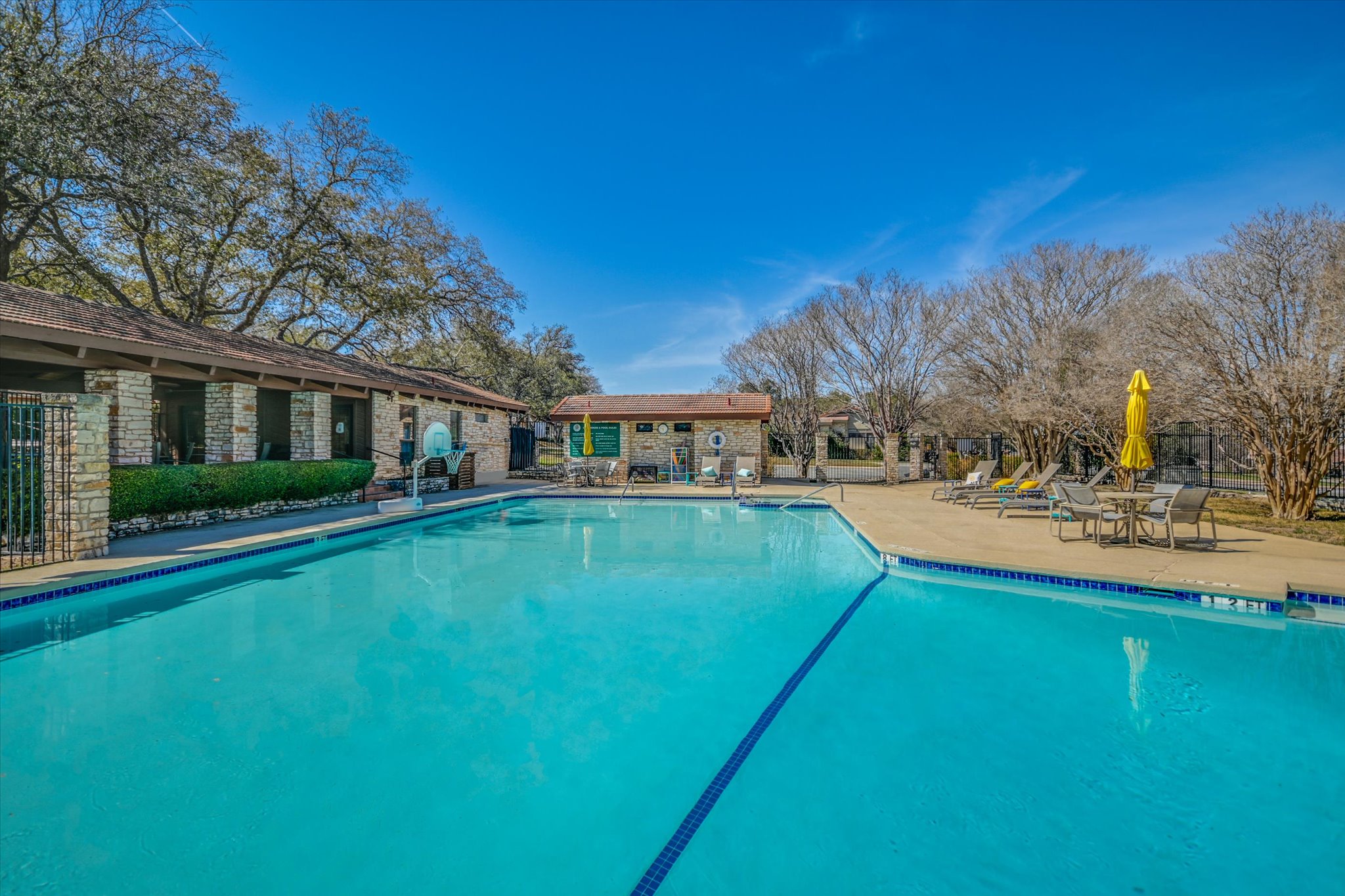 105 Crescent Bluff Austin, TX 78734 - Photo 27 of 28 a view of a house with a yard