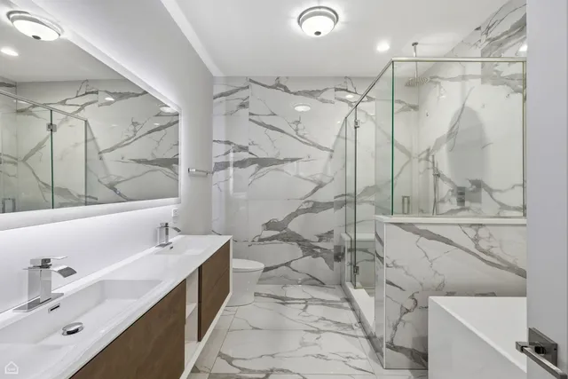 a bathroom with a sink and mirror