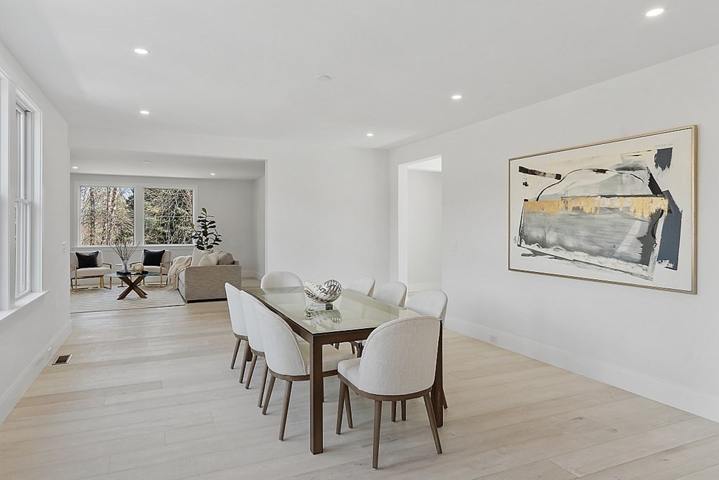 66 Spencer Brook Road Concord, MA 01742 - Photo 14 of 37 a view of a work space with furniture and wooden floor