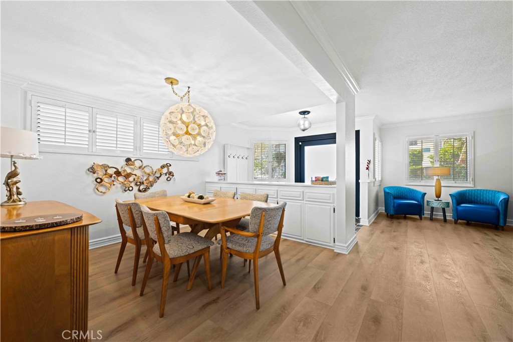 86 North Vía Di Roma Walk Long Beach, CA 90803 - Photo 12 of 42 a view of a livingroom with furniture and window